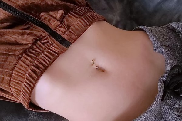 piercing v pupíku rizika